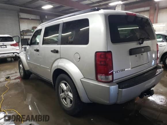 2008 Dodge Nitro SXT с VIN 1D8GU28KX8W129037, выставлен на аукционе Copart как лот 79534734 с пробегом 162 073 миль миль и Списание • Salvage title. История ставок и продаж доступна на DreamBid. Изображение 2.