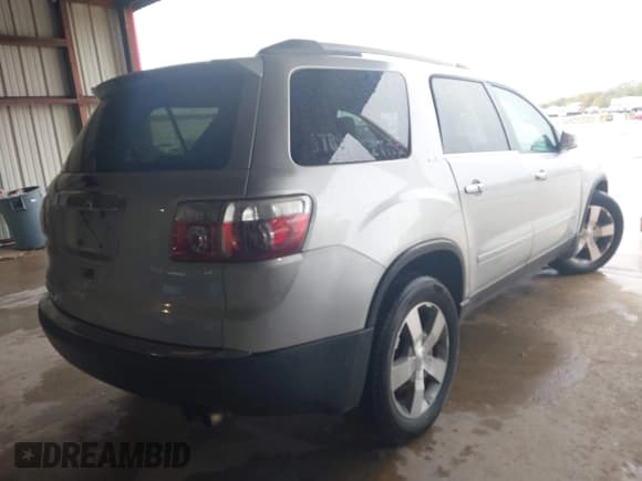 ✅ 2011 GMC Acadia SLT1 • VIN: 1GKKRRED4BJ417752 • Lot: 43782423. Listed on IAAI with 256,394 mi. Free auction sales archive from the USA and detailed vehicle history report at DreamBid. Image 4.