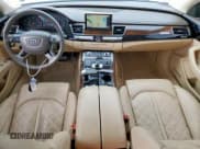 ✅ 2014 Audi A8 3.0T • VIN: WAURGAFD1EN013057 • Лот: 61161595. Опубликован ранее на Copart с пробегом 103 560 миль. Бесплатный доступ к архиву аукционных продаж из США и подробный отчёт об истории автомобиля на DreamBid. Изображение 8.