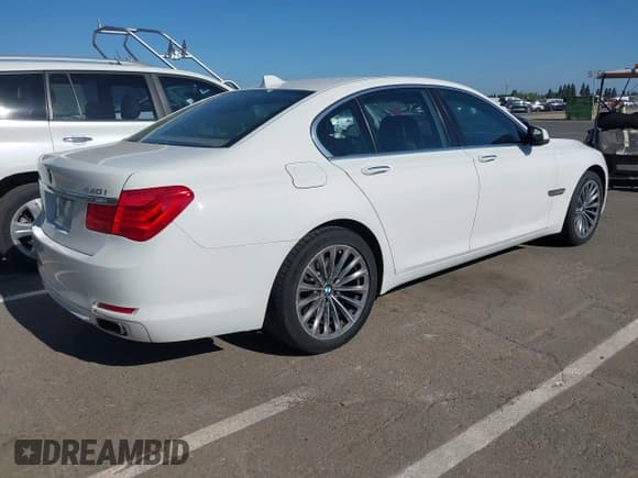 ✅ 2012 BMW 7 Series 740i • VIN: WBAKA4C51CDS99206 • Lot: 42555719. Listed on IAAI with 104,303 mi. Free auction sales archive from the USA and detailed vehicle history report at DreamBid. Image 4.