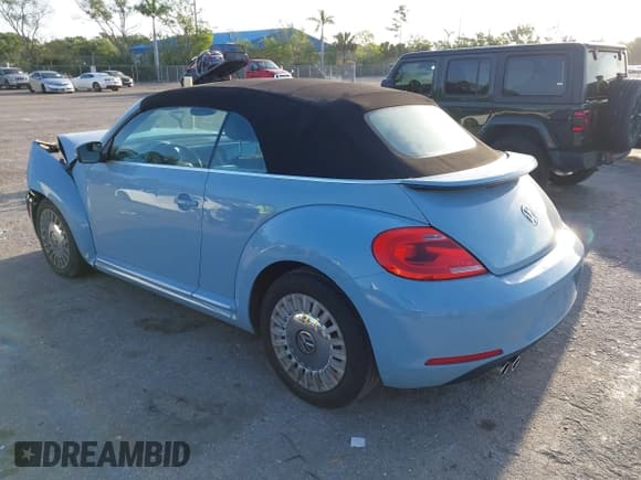 ✅ 2013 Volkswagen Beetle 2.5L • VIN: 3VW5P7AT0DM812482 • Lot: 42103987. Listed on IAAI with 105,513 mi. Free auction sales archive from the USA and detailed vehicle history report at DreamBid. Image 3.