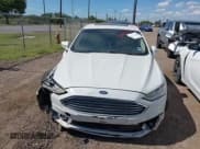 ✅ 2018 Ford Fusion Titanium • VIN: 3FA6P0D99JR124788 • Lot: 42789944. Listed on IAAI with 127,499 mi. Free auction sales archive from the USA and detailed vehicle history report at DreamBid. Image 12.