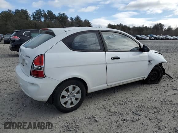 ✅ 2008 Hyundai Accent GS • VIN: KMHCM36C68U058375 • Лот: 41457755. Опубликован ранее на Copart с пробегом 163 843 миль. Бесплатный доступ к архиву аукционных продаж из США и подробный отчёт об истории автомобиля на DreamBid. Изображение 3.