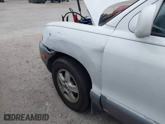 2003 Hyundai Santa Fe GLS с VIN KM8SC13D63U379437, выставлен на аукционе IAAI как лот 41608497 с пробегом 299 247 миль миль и . История ставок и продаж доступна на DreamBid. Изображение 6.