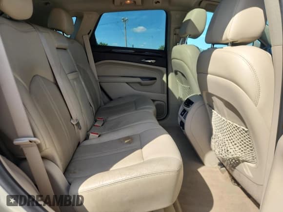 ✅ 2015 Cadillac SRX Premium Collection • VIN: 3GYFNGE38FS547147 • Lot: 70882935. Wystawiony na Copart z przebiegiem 160 153 mil. Bezpłatny archiwum sprzedaży aukcyjnych z USA i szczegółowy raport historii pojazdu na DreamBid. Zdjęcie 11.