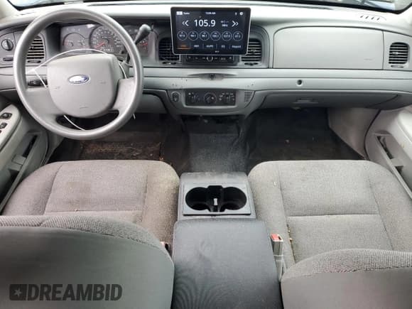 ✅ 2005 Ford Police Interceptor • VIN: 2FAFP71W05X150819 • Лот: 84702185. Опубликован ранее на Copart с пробегом 70 212 миль. Бесплатный доступ к архиву аукционных продаж из США и подробный отчёт об истории автомобиля на DreamBid. Изображение 8.