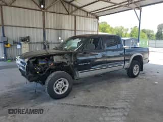 2000 Dodge Dakota Sport с VIN 1B7GG2AN9YS793766, выставлен на аукционе Copart как лот 56201465 с пробегом Не указан миль и На запчасти • Non repairable. История ставок и продаж доступна на DreamBid. Изображение 1.