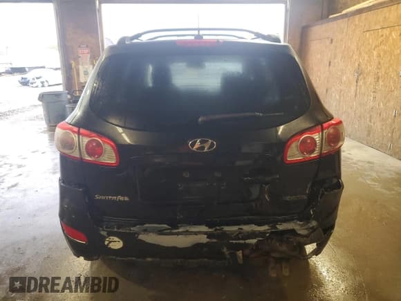 ✅ 2012 Hyundai Santa Fe GLS • VIN: 5XYZG4AG3CG108617 • Lot: 73287674. Listed on Copart with 187,739 mi. Free auction sales archive from the USA and detailed vehicle history report at DreamBid. Image 6.