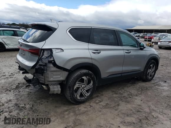 ✅ 2023 Hyundai Santa Fe SE • VIN: 5NMS14AJ6PH599985 • Lot: 90428445. Listed on Copart with 148,907 mi. Free auction sales archive from the USA and detailed vehicle history report at DreamBid. Image 3.