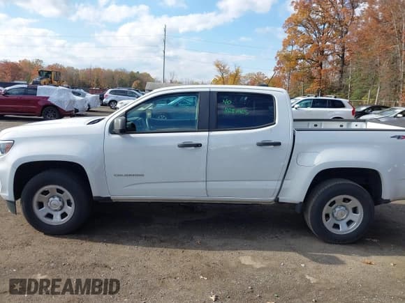 ✅ 2021 Chevrolet Colorado 4WD Work Truck • VIN: 1GCGTBEN6M1129902 • Лот: 43556456. Опубликован ранее на IAAI с пробегом 103 553 миль. Бесплатный доступ к архиву аукционных продаж из США и подробный отчёт об истории автомобиля на DreamBid. Изображение 14.
