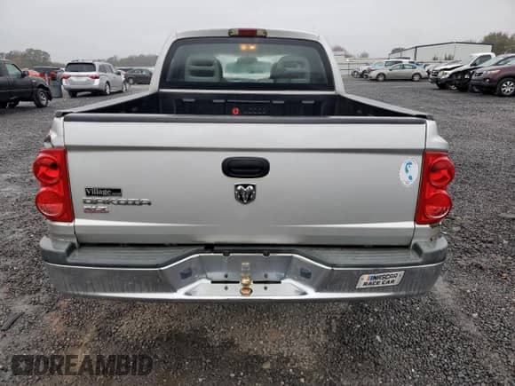 2006 Dodge Dakota SLT с VIN 1D7HE48K86S605839, выставлен на аукционе Copart как лот 78135534 с пробегом 205 283 миль миль и Списание • Salvage title. История ставок и продаж доступна на DreamBid. Изображение 6.