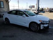 ✅ 2017 Ford Fusion Hybrid Titanium • VIN: 3FA6P0RUXHR234093 • Lot: 57997865. Wystawiony na Copart z przebiegiem 124 862 mil. Bezpłatny archiwum sprzedaży aukcyjnych z USA i szczegółowy raport historii pojazdu na DreamBid. Zdjęcie 4.