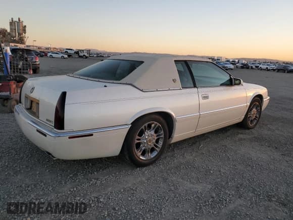 ✅ 2002 Cadillac Eldorado ESC • VIN: 1G6EL12Y72B101231 • Лот: 79971954. Опубликован ранее на Copart с пробегом 87 408 миль. Бесплатный доступ к архиву аукционных продаж из США и подробный отчёт об истории автомобиля на DreamBid. Изображение 3.