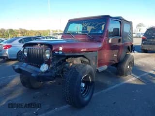 ✅ 2001 Jeep Wrangler Sahara • VIN: 1J4FA59S71P376013 • Лот: 43461227. Опубликован ранее на IAAI с пробегом 165 697 миль. Бесплатный доступ к архиву аукционных продаж из США и подробный отчёт об истории автомобиля на DreamBid. Изображение 2.