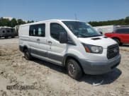✅ 2016 Ford Transit Cargo • VIN: 1FTYE1ZM9GKA40186 • Lot: 60616615. Listed on Copart with 157,411 mi. Free auction sales archive from the USA and detailed vehicle history report at DreamBid. Image 4.