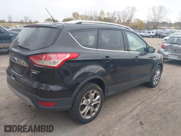 ✅ 2015 Ford Escape Titanium • VIN: 1FMCU9JX2FUB06691 • Lot: 43556776. Listed on IAAI with 178,097 mi. Free auction sales archive from the USA and detailed vehicle history report at DreamBid. Image 4.