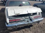 ✅ 1985 Oldsmobile Toronado Custom Brougham • VIN: 1G3EZ57YXFE315260 • Lot: 42051171. Wystawiony na IAAI z przebiegiem Nie podano. Bezpłatny archiwum sprzedaży aukcyjnych z USA i szczegółowy raport historii pojazdu na DreamBid. Zdjęcie 6.