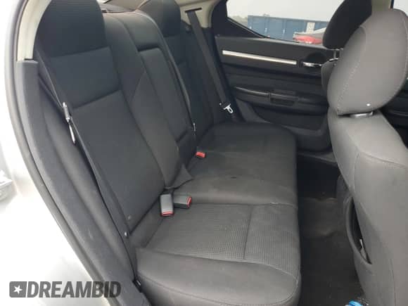 2009 Dodge Charger SXT с VIN 2B3KA33V69H504044, выставлен на аукционе Copart как лот 54199914 с пробегом 214 200 миль миль и Списание • Salvage title. История ставок и продаж доступна на DreamBid. Изображение 10.