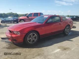 ✅ 2012 Ford Mustang Premium • VIN: 1ZVBP8AM0C5211028 • Lot: 85733375. Listed on Copart with 205,137 mi. Free auction sales archive from the USA and detailed vehicle history report at DreamBid. Image 1.