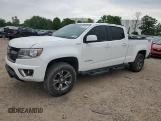 ✅ 2016 Chevrolet Colorado 4WD Z71 • VIN: 1GCPTDE14G1365056 • Лот: 61713225. Опубликован ранее на Copart с пробегом 127 334 миль. Бесплатный доступ к архиву аукционных продаж из США и подробный отчёт об истории автомобиля на DreamBid. Изображение 1.