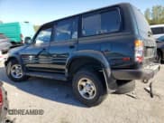✅ 1996 Toyota Land Cruiser • VIN: JT3HJ85J8T0140189 • Lot: 76720784. Listed on Copart with 167,649 mi. Free auction sales archive from the USA and detailed vehicle history report at DreamBid. Image 2.