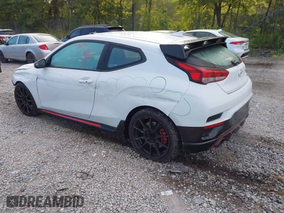 2019 Hyundai Veloster N z VIN KMHT36AH0KU001538, wystawiony jako IAAI lot #43193750 z przebiegiem 61 712 mil mil oraz . Historia ofert i sprzedaży dostępna na DreamBid. Obrazek 3.