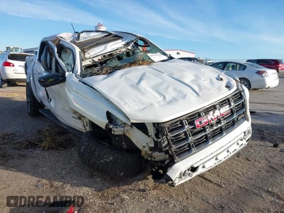 ✅ 2023 GMC Canyon 4WD AT4 • VIN: 1GTP6DEK8P1162090 • Lot: 43630401. Listed on IAAI with Not provided. Free auction sales archive from the USA and detailed vehicle history report at DreamBid. Image 1.