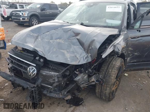 ✅ 2022 Volkswagen Tiguan SE R-Line Black • VIN: 3VV8B7AXXNM041887 • Лот: 43654622. Опубликован ранее на IAAI с пробегом 61 461 миль. Бесплатный доступ к архиву аукционных продаж из США и подробный отчёт об истории автомобиля на DreamBid. Изображение 6.