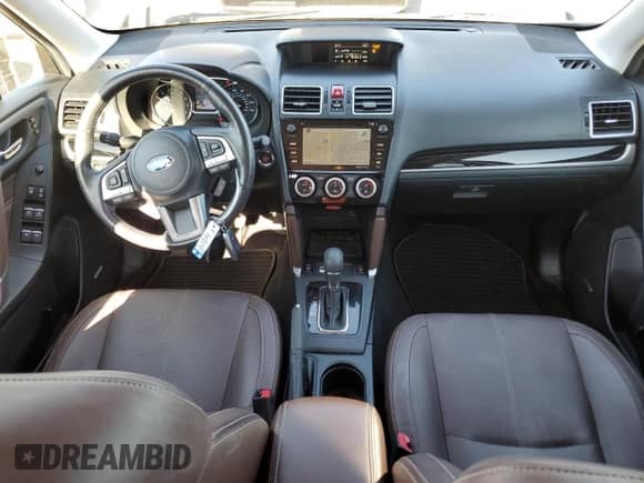 2017 Subaru Forester Touring с VIN JF2SJGWC4HH585860, выставлен на аукционе Copart как лот 85157815 с пробегом 89 784 миль миль и Списание • Salvage title. История ставок и продаж доступна на DreamBid. Изображение 8.