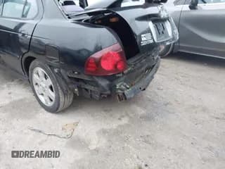 ✅ 2004 Nissan Sentra SE-R • VIN: 3N1AB51D84L732983 • Lot: 43754207. Listed on IAAI with 94,551 mi. Free auction sales archive from the USA and detailed vehicle history report at DreamBid. Image 6.