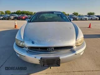 ✅ 1997 Buick Riviera • VIN: 1G4GD2211V4705731 • Lot: 70320995. Wystawiony na Copart z przebiegiem Nie podano. Bezpłatny archiwum sprzedaży aukcyjnych z USA i szczegółowy raport historii pojazdu na DreamBid. Zdjęcie 5.