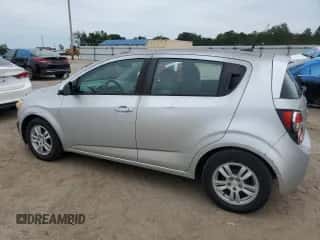 2012 Chevrolet Sonic LS с VIN 1G1JB6SH8C4111471, выставлен на аукционе Copart как лот 69838304 с пробегом Не указан миль и Списание • Salvage title. История ставок и продаж доступна на DreamBid. Изображение 2.