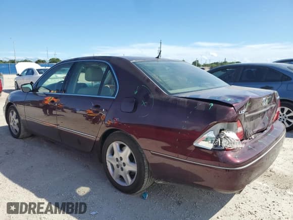 ✅ 2004 Lexus LS 430 • VIN: JTHBN36F840129356 • Lot: 85109895. Listed on Copart with 284,592 mi. Free auction sales archive from the USA and detailed vehicle history report at DreamBid. Image 2.