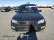 ✅ 1999 Toyota RAV4 • VIN: JT3GP10V9X7061574 • Lot: 68948315. Listed on Copart with 213,625 mi. Free auction sales archive from the USA and detailed vehicle history report at DreamBid. Image 5.