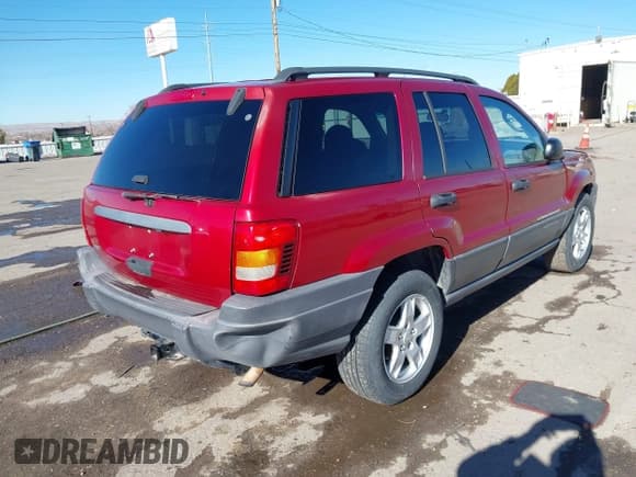 ✅ 2004 Jeep Grand Cherokee Laredo • VIN: 1J4GX48S24C242505 • Lot: 43869706. Listed on IAAI with 195,490 mi. Free auction sales archive from the USA and detailed vehicle history report at DreamBid. Image 4.
