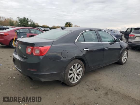 ✅ 2015 Chevrolet Malibu LTZ • VIN: 1G11F5SL1FF106382 • Lot: 90700305. Listed on Copart with 124,413 mi. Free auction sales archive from the USA and detailed vehicle history report at DreamBid. Image 3.
