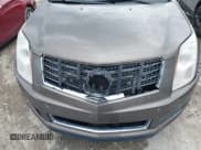 ✅ 2014 Cadillac SRX • VIN: 3GYFNAE32ES582939 • Lot: 42249851. Wystawiony na IAAI z przebiegiem 120 072 mil. Bezpłatny archiwum sprzedaży aukcyjnych z USA i szczegółowy raport historii pojazdu na DreamBid. Zdjęcie 6.