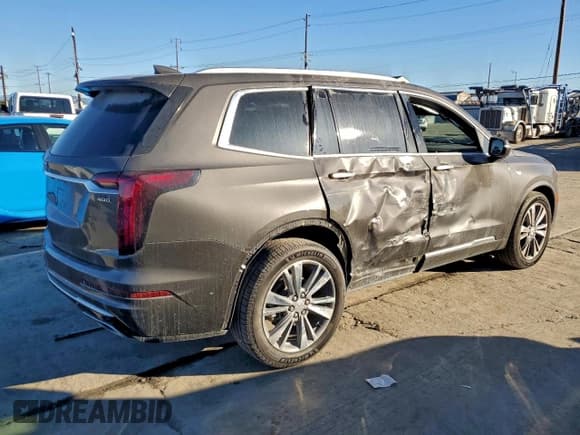✅ 2020 Cadillac XT6 FWD Premium Luxury • VIN: 1GYKPCRS7LZ146285 • Lot: 94688425. Wystawiony na Copart z przebiegiem 58 346 mil. Bezpłatny archiwum sprzedaży aukcyjnych z USA i szczegółowy raport historii pojazdu na DreamBid. Zdjęcie 3.