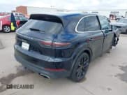 ✅ 2022 Porsche Cayenne E-Hybrid • VIN: WP1AE2AYXNDA26559 • Lot: 41113313. Listed on IAAI with 28,591 mi. Free auction sales archive from the USA and detailed vehicle history report at DreamBid. Image 4.