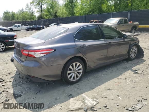 2019 Toyota Camry LE с VIN 4T1B11HK2KU159868, выставлен на аукционе Copart как лот 55486655 с пробегом 145 698 миль миль и Списание • Salvage title. История ставок и продаж доступна на DreamBid. Изображение 3.