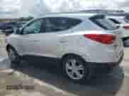 2013 Hyundai Tucson GLS z VIN KM8JU3AC4DU574811, wystawiony jako Copart lot #69299034 z przebiegiem 149 591 mil mil oraz Szkoda całkowita • Salvage title. Historia ofert i sprzedaży dostępna na DreamBid. Obrazek 2.