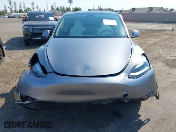 ✅ 2025 Tesla Model Y Performance • VIN: 7SAYGDEF7SF261071 • Lot: 42738857. Listed on IAAI with 7,305 mi. Free auction sales archive from the USA and detailed vehicle history report at DreamBid. Image 13.