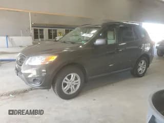 ✅ 2011 Hyundai Santa Fe GLS • VIN: 5XYZGDAG1BG057486 • Lot: 71652255. Listed on Copart with 187,805 mi. Free auction sales archive from the USA and detailed vehicle history report at DreamBid. Image 1.