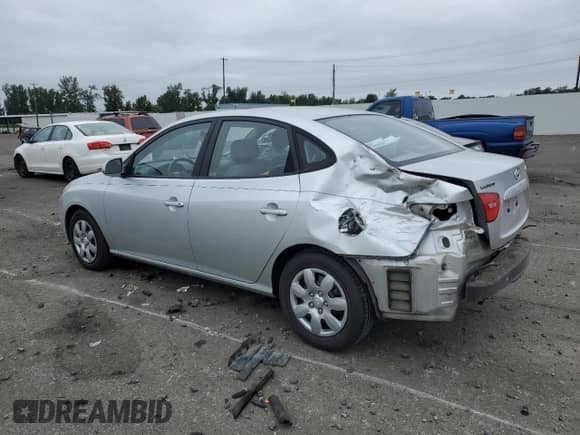 2007 Hyundai Elantra GLS with VIN KMHDU46DX7U084981, listed as a Copart auction lot 61230984 with 93,887 mi miles and Salvage title. Bid and sale history available at DreamBid. Image 2.