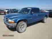 2002 Dodge Dakota SLT with VIN 1B7GG42N32S618480, listed as a Copart auction lot 66386755 with 106,001 mi miles and Clean title. Bid and sale history available at DreamBid. Image 1.