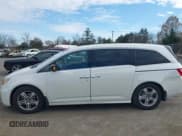 ✅ 2012 Honda Odyssey Touring • VIN: 5FNRL5H9XCB126080 • Lot: 43686755. Listed on IAAI with 116,383 mi. Free auction sales archive from the USA and detailed vehicle history report at DreamBid. Image 14.