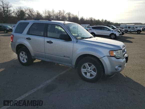✅ 2009 Ford Escape Hybrid • VIN: 1FMCU59349KB61444 • Lot: 82346514. Listed on Copart with 119,578 mi. Free auction sales archive from the USA and detailed vehicle history report at DreamBid. Image 4.