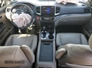 ✅ 2017 Honda Pilot EX-L • VIN: 5FNYF6H59HB051627 • Lot: 87286775. Listed on Copart with 104,700 mi. Free auction sales archive from the USA and detailed vehicle history report at DreamBid. Image 8.