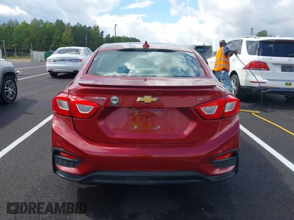 2018 Chevrolet Cruze LT with VIN 1G1BE5SM4J7217012, listed as a IAAI auction lot 43287685 with 125,689 mi miles and . Bid and sale history available at DreamBid. Image 16.