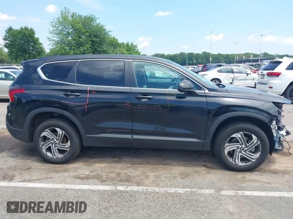 ✅ 2021 Hyundai Santa Fe SE • VIN: 5NMS1DAJ0MH318582 • Lot: 42681443. Listed on IAAI with 94,808 mi. Free auction sales archive from the USA and detailed vehicle history report at DreamBid. Image 13.